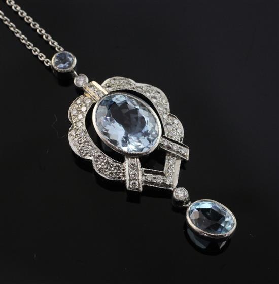 A white gold, diamond and aquamarine drop pendant necklace, pendant 1.75in.